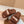 FURRY SLIDES IN BROWN CURLY SHEARLING
