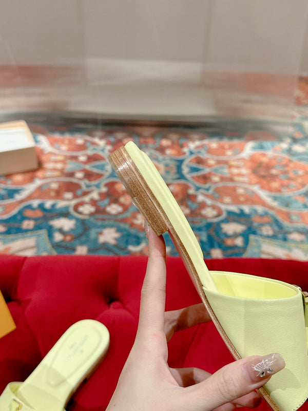 lv capri flat mule pastel yellow calfskin