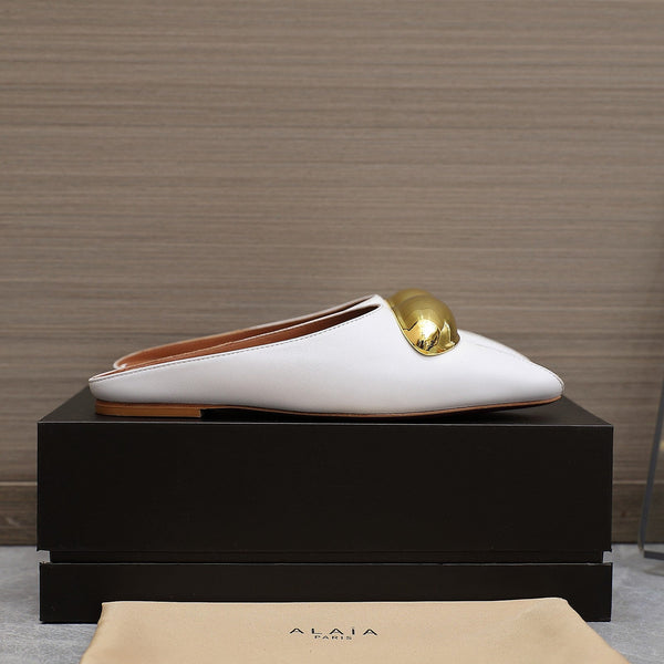 ALAIA FLAT MULE IN WHITE LAMBSKIN WITH GOLD HARDWARE