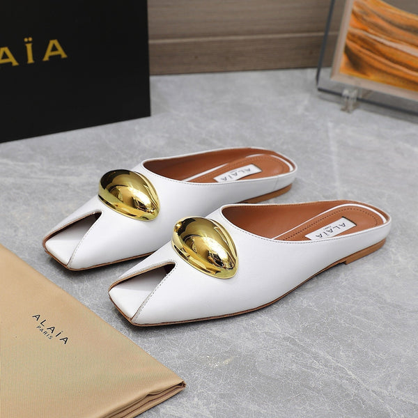 ALAIA FLAT MULE IN WHITE LAMBSKIN WITH GOLD HARDWARE