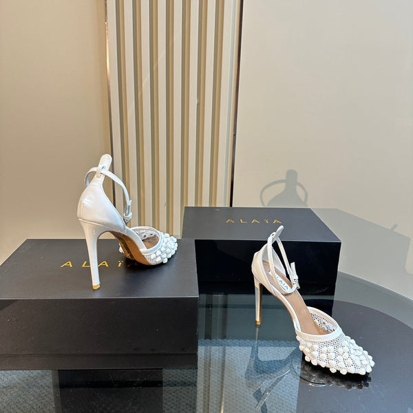 ALAIA HIGH FISHNET PUMPS WITH STUDS IN WHITE LYCRA MESH AND LAMBSKIN
