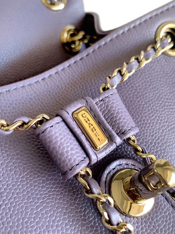 CHANEL 25S BACKPACK 21 CM IN PURPLE LAMBSKIN